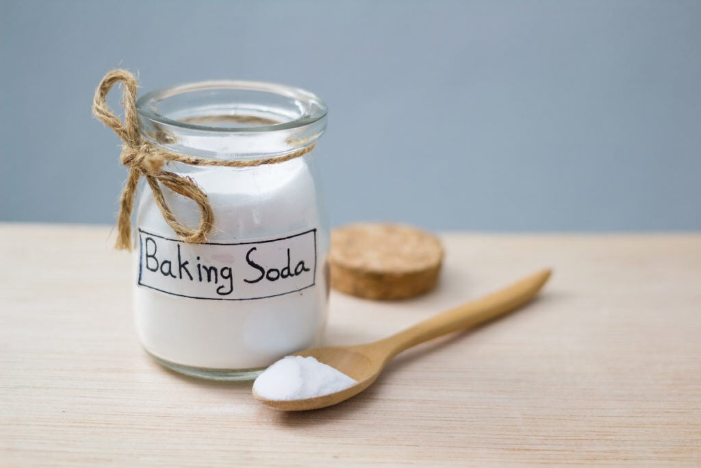 Baking soda is a natural detergent that can eliminate soot.