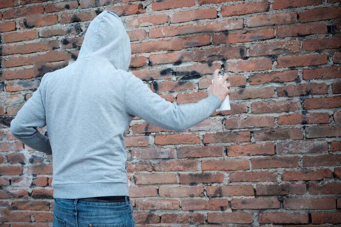 Graffiti being done by a vandal
