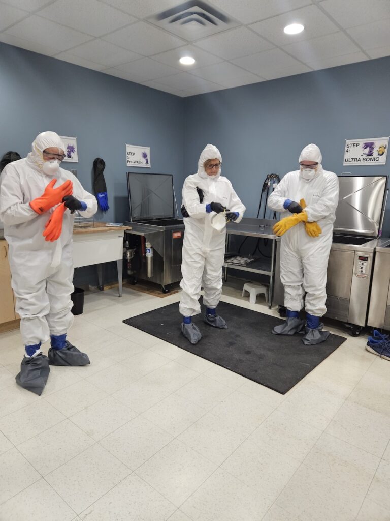 Class participants learned about biohazard cleanup precautions, such as wearing PPE gear.