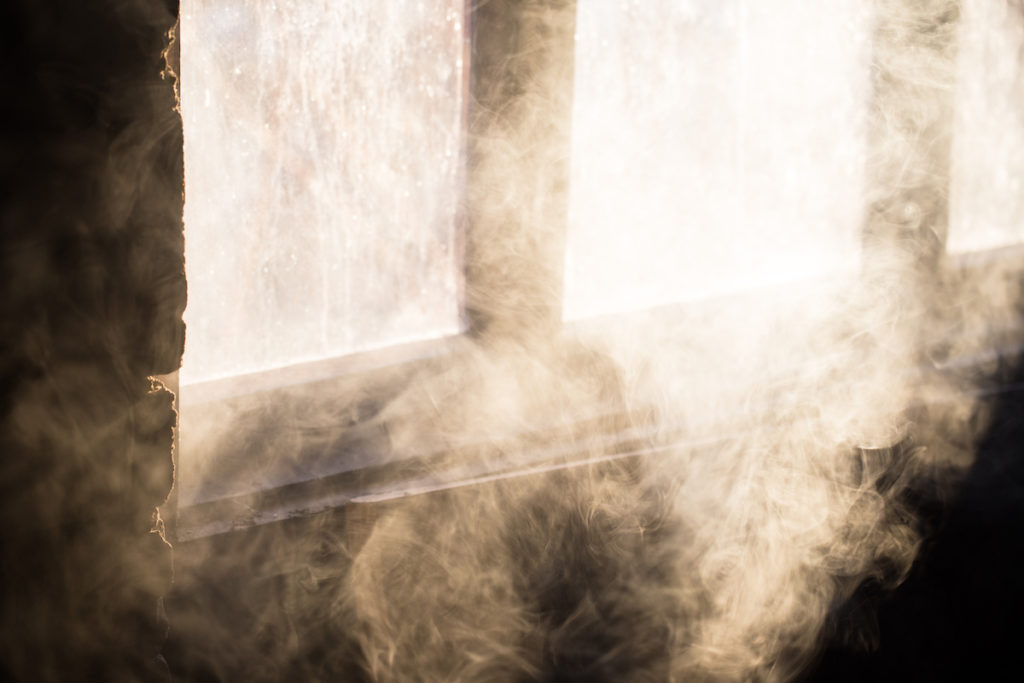 smoke damage in a house which is very damaged by the smoke after house fire