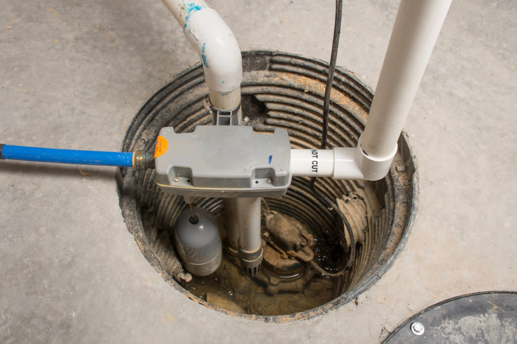 a sump pump extracts water from a waterlogged basement or crawlspace and it repairs water damage