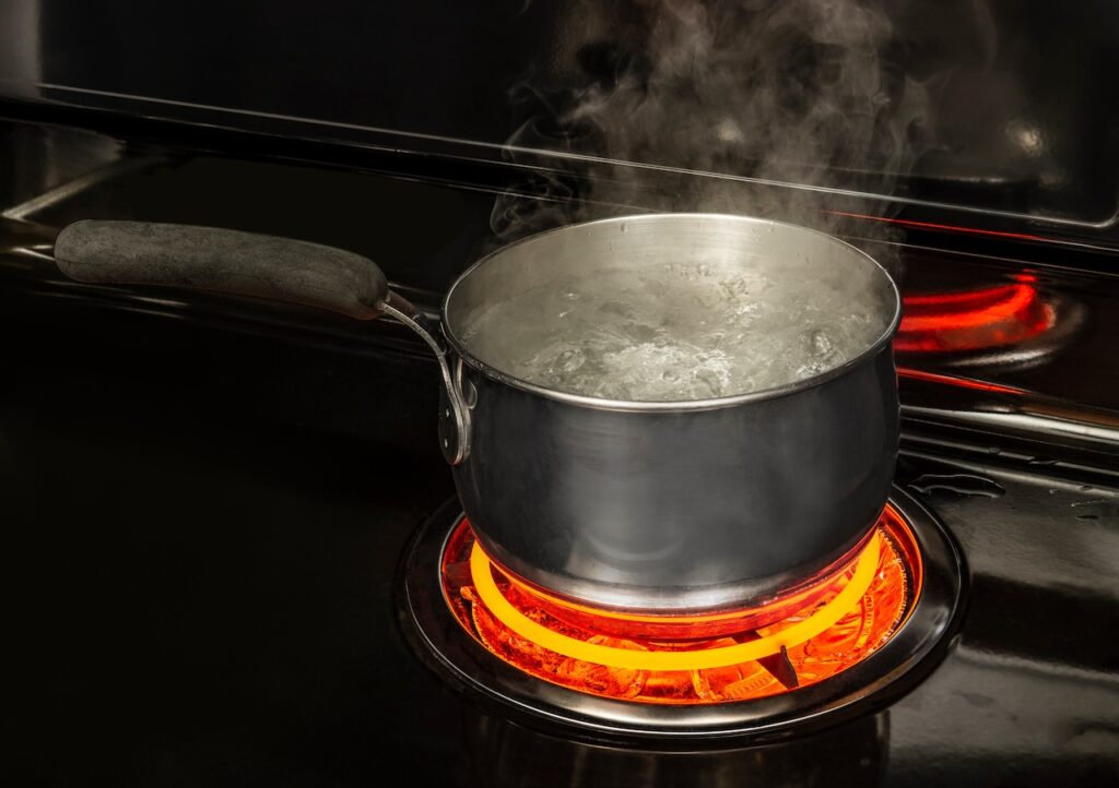 Boil a pot of water for quick, humidifying fix.